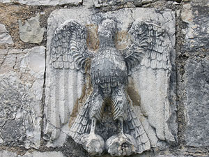 Eagle carved into the outer wall of the Orthodox Church of St Nicholas at Mesopotam (Photo: Robert Elsie, March 2008).