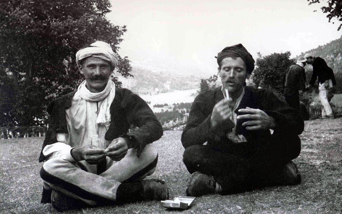 Two Dukagjini men smoking (Photo: Shan Pici, 1938).