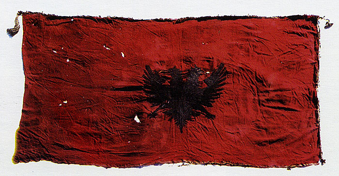 Early Albanian flag from the collection of Ekrem bey Vlora, now preserved at the Institute of Folk Culture in Tirana.
