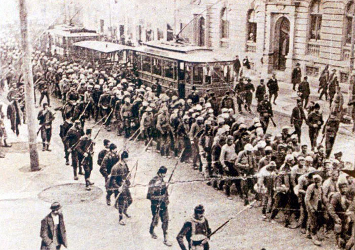 Captive Albanian fighters being paraded through the streets of Belgrade