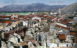 Colour postcard of Shkodra showing the destruction of the old bazaar.